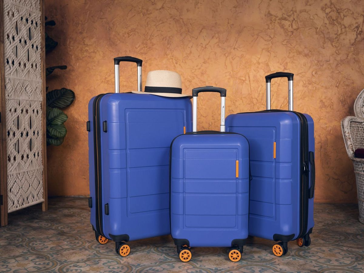 Three suitcases packed and ready for a trip